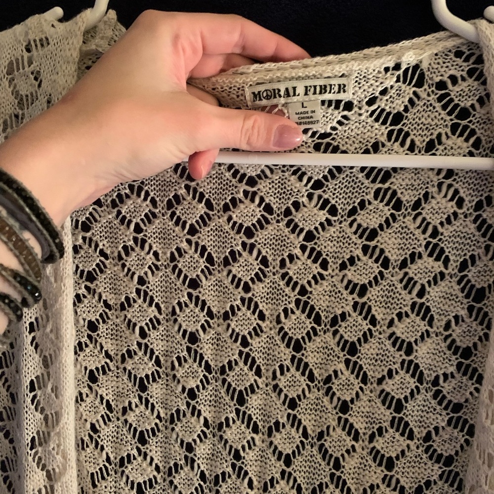 A never worn crocheted maxi vest by morale fiber!Loved but never ended up using.